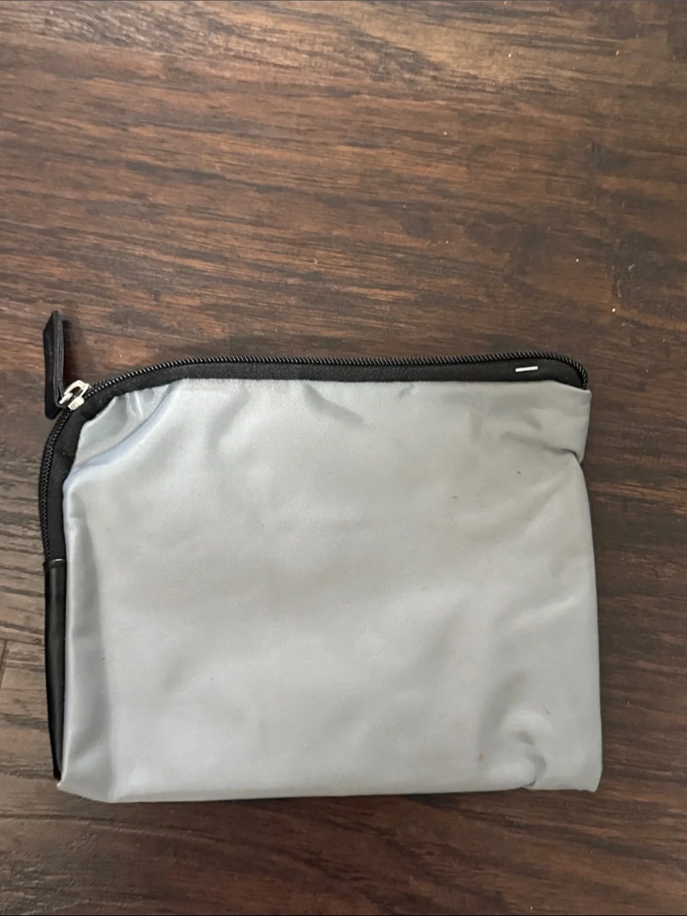 Tumi Silver and Black Toiletry Pouch – Compact Travel Organizer